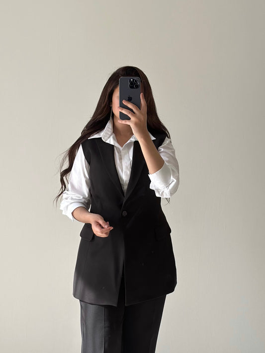 long black vest